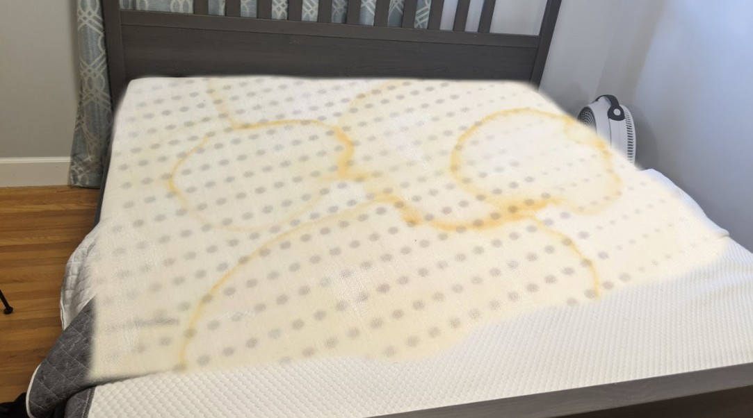 dark urine stains on memory foam mattress